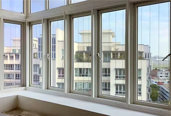 Invisible grills fitted inside apartment windows